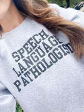 Load image into Gallery viewer, Speech Language Pathologist SLP Varsity Letters Unisex Heavy Blend™ Crewneck Sweatshirt
