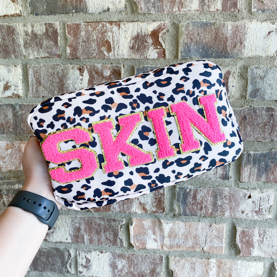 'skin' | large leopard pouch